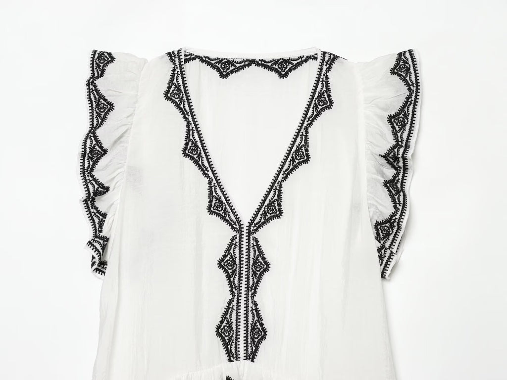 Women's contrasting embroidered top