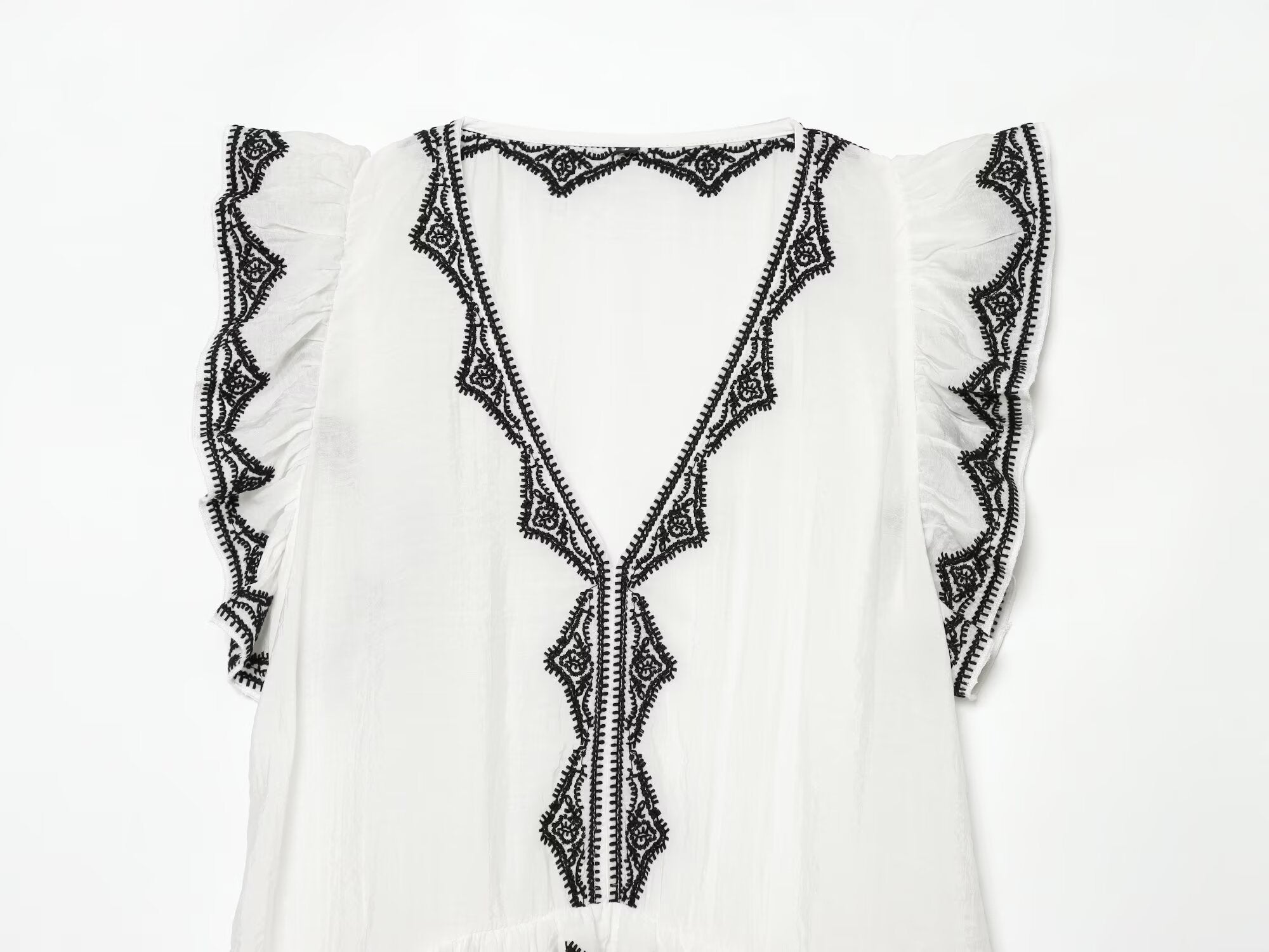 Women's contrasting embroidered top