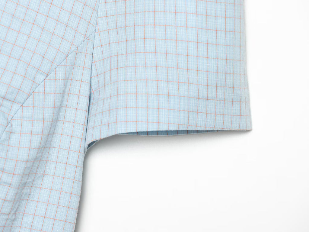 Women's short skirt style hem plaid top