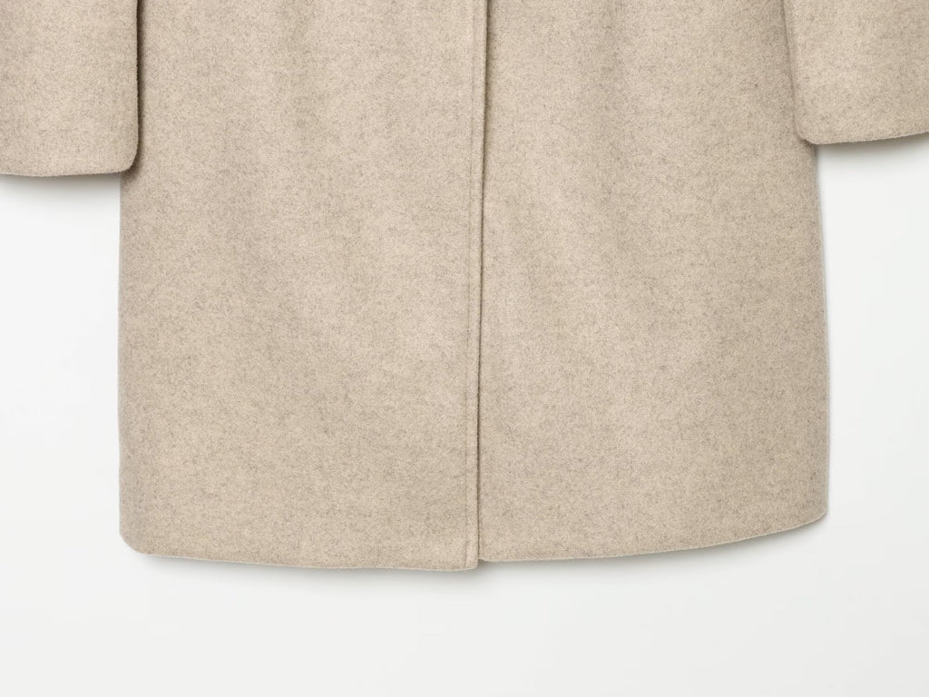 Women's with shoulder pads long style soft textured coat