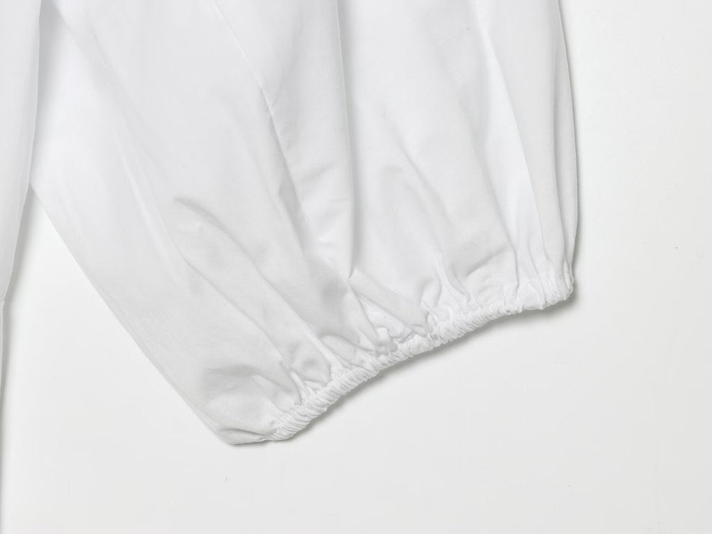 Women's skirt style hem bubble sleeve shirt
