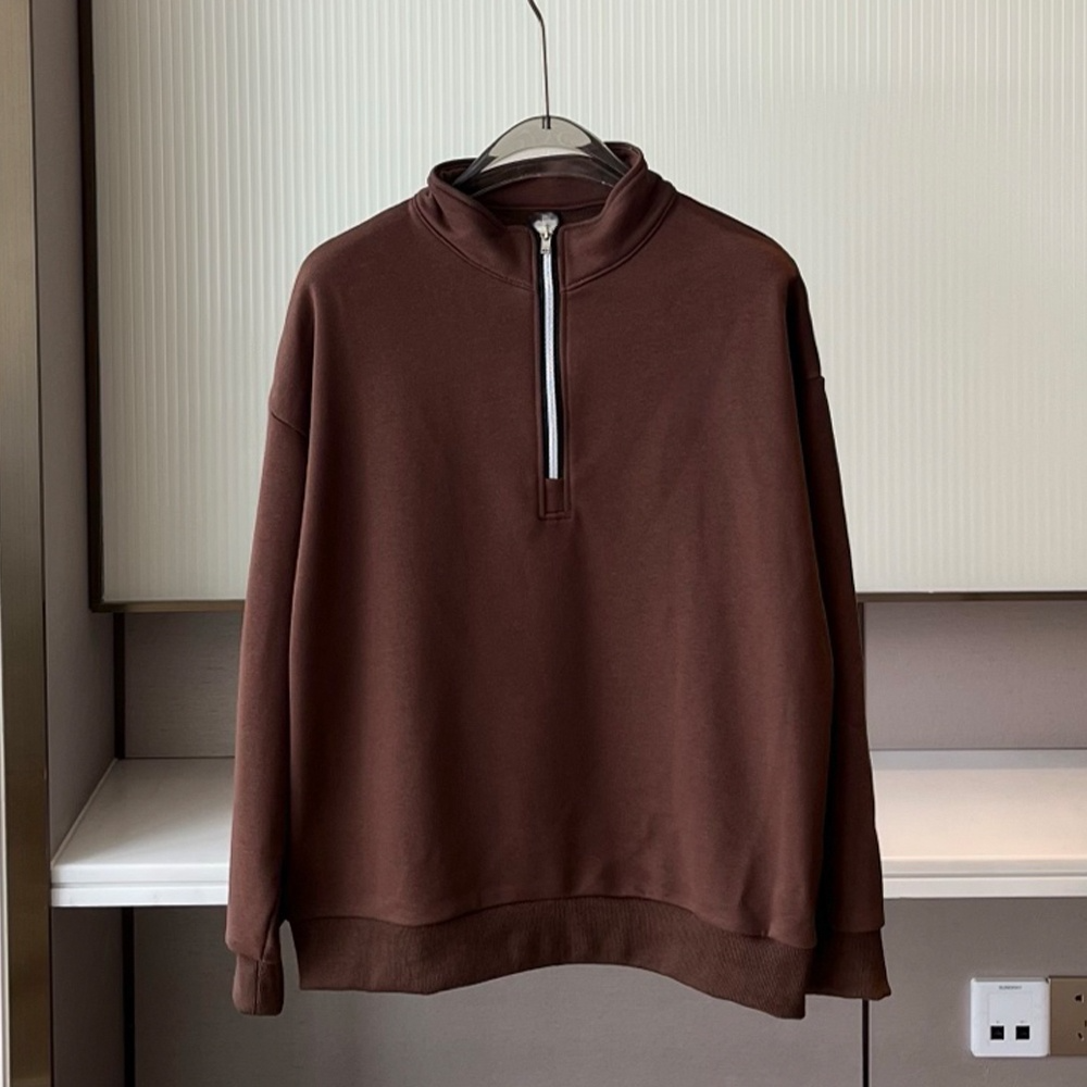 Women's new loose sweater with stand-up collar and half zipper design