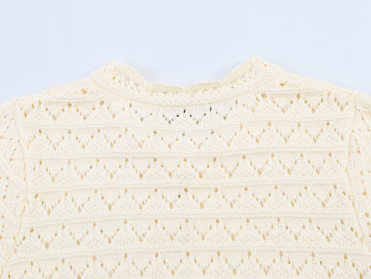 Women's round neck hollow knitted Coat