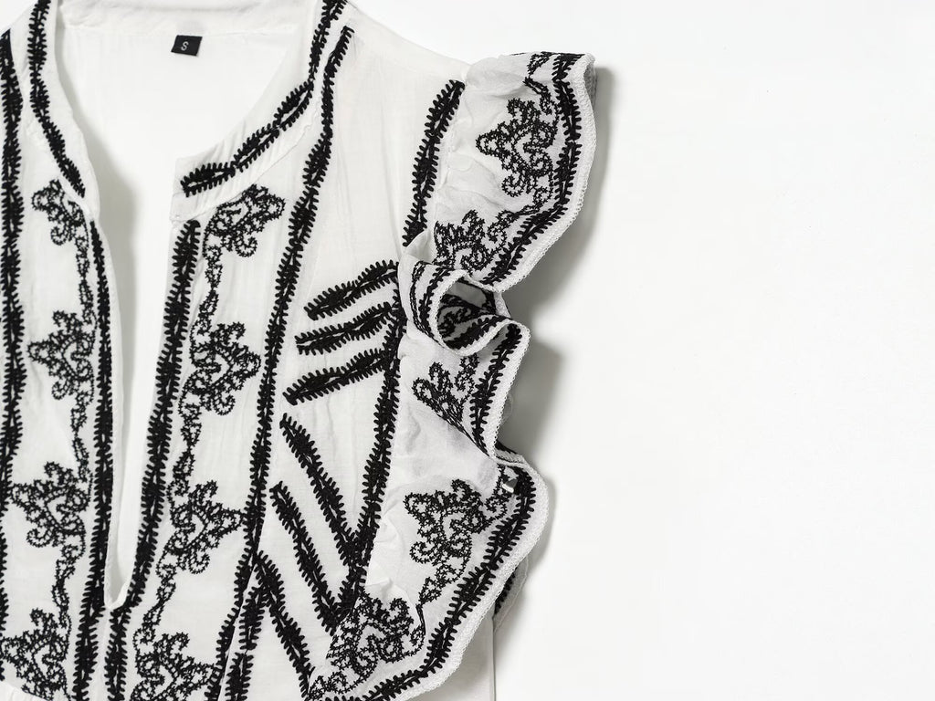 Women's contrasting embroidered mini dress