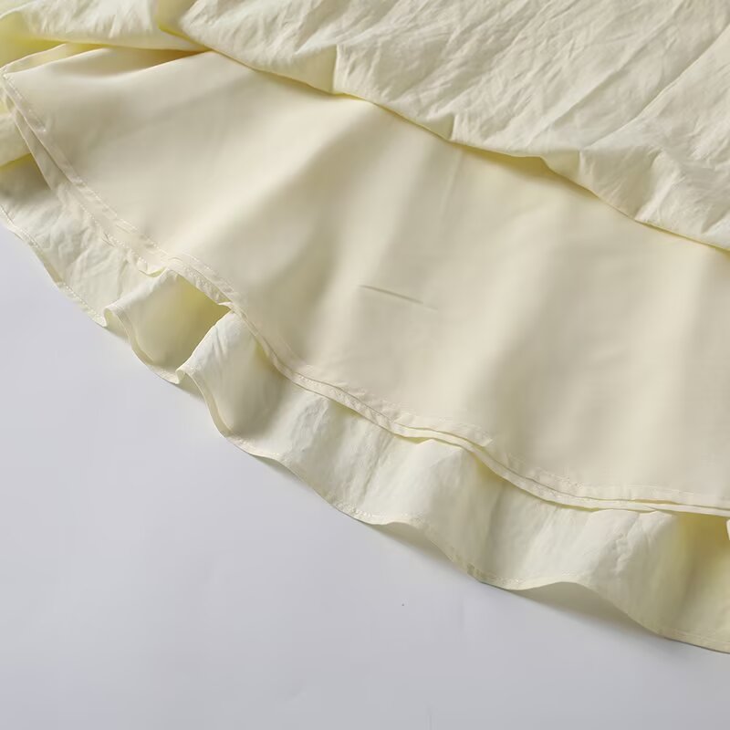 Women's pleated design asymmetric MIDI skirt