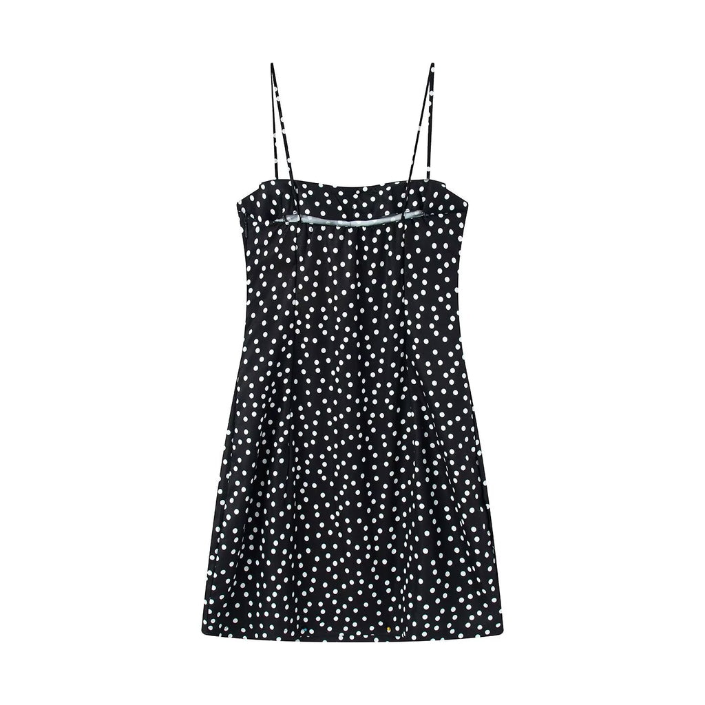 Women's sleeveless polka dot suspender dress