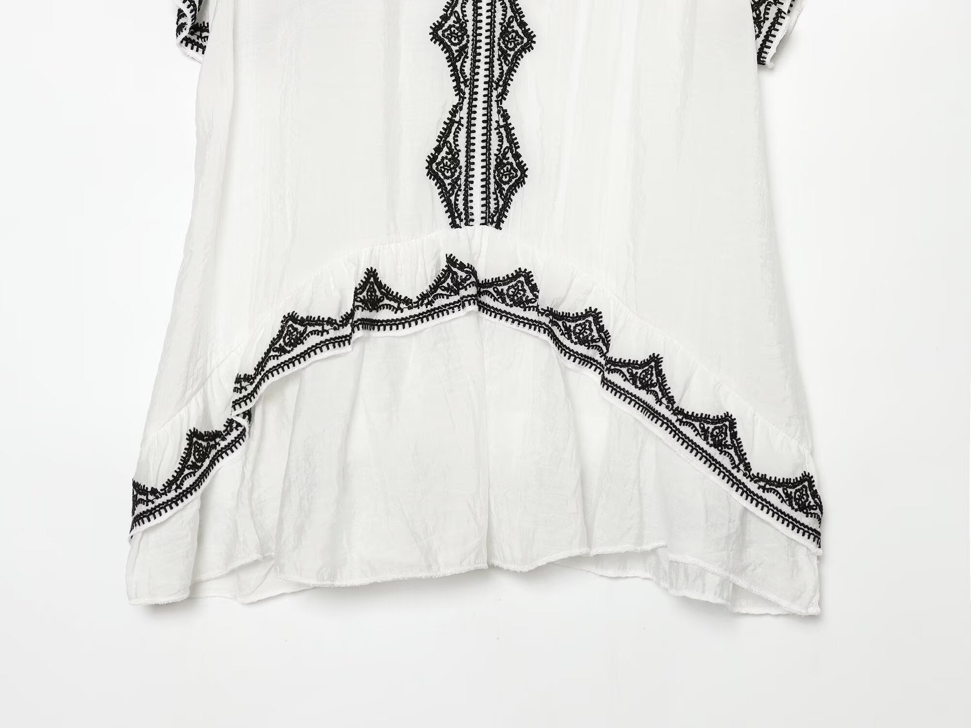 Women's contrasting embroidered top