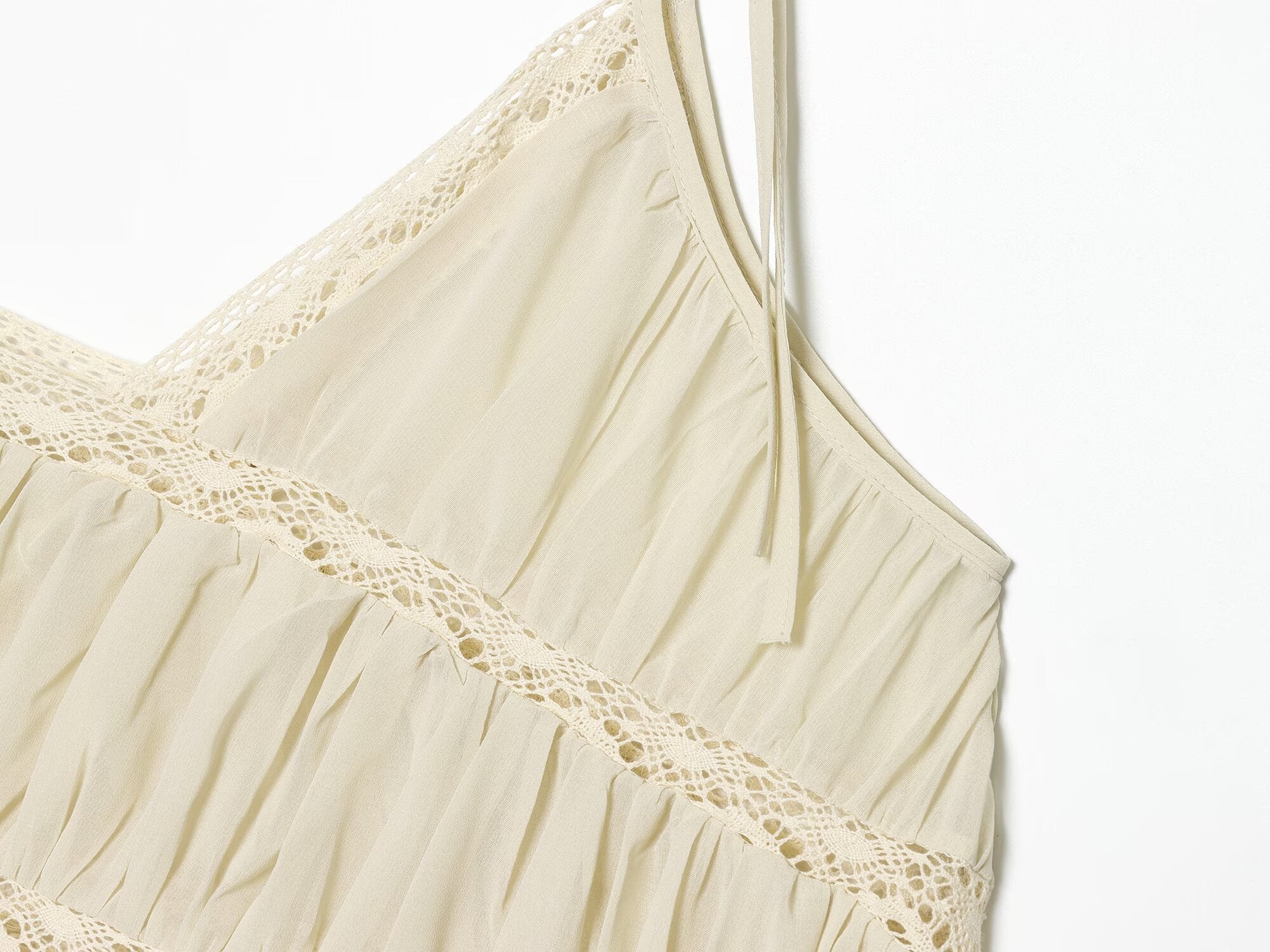 Women's pleated asymmetrical suspender top