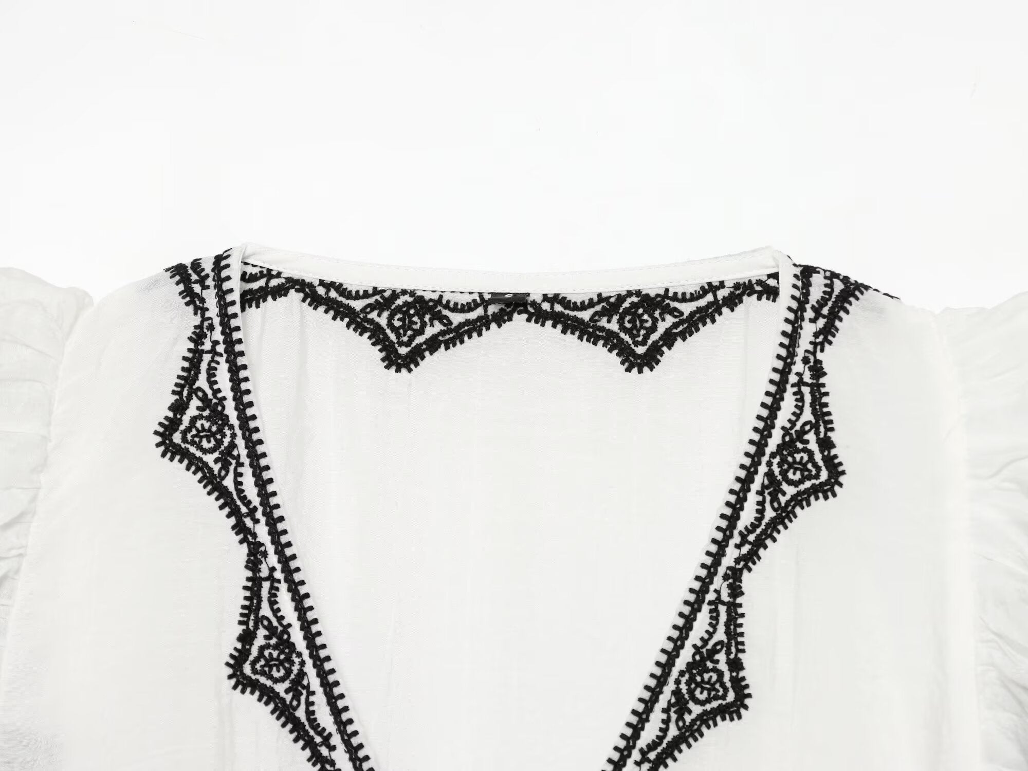 Women's contrasting embroidered top