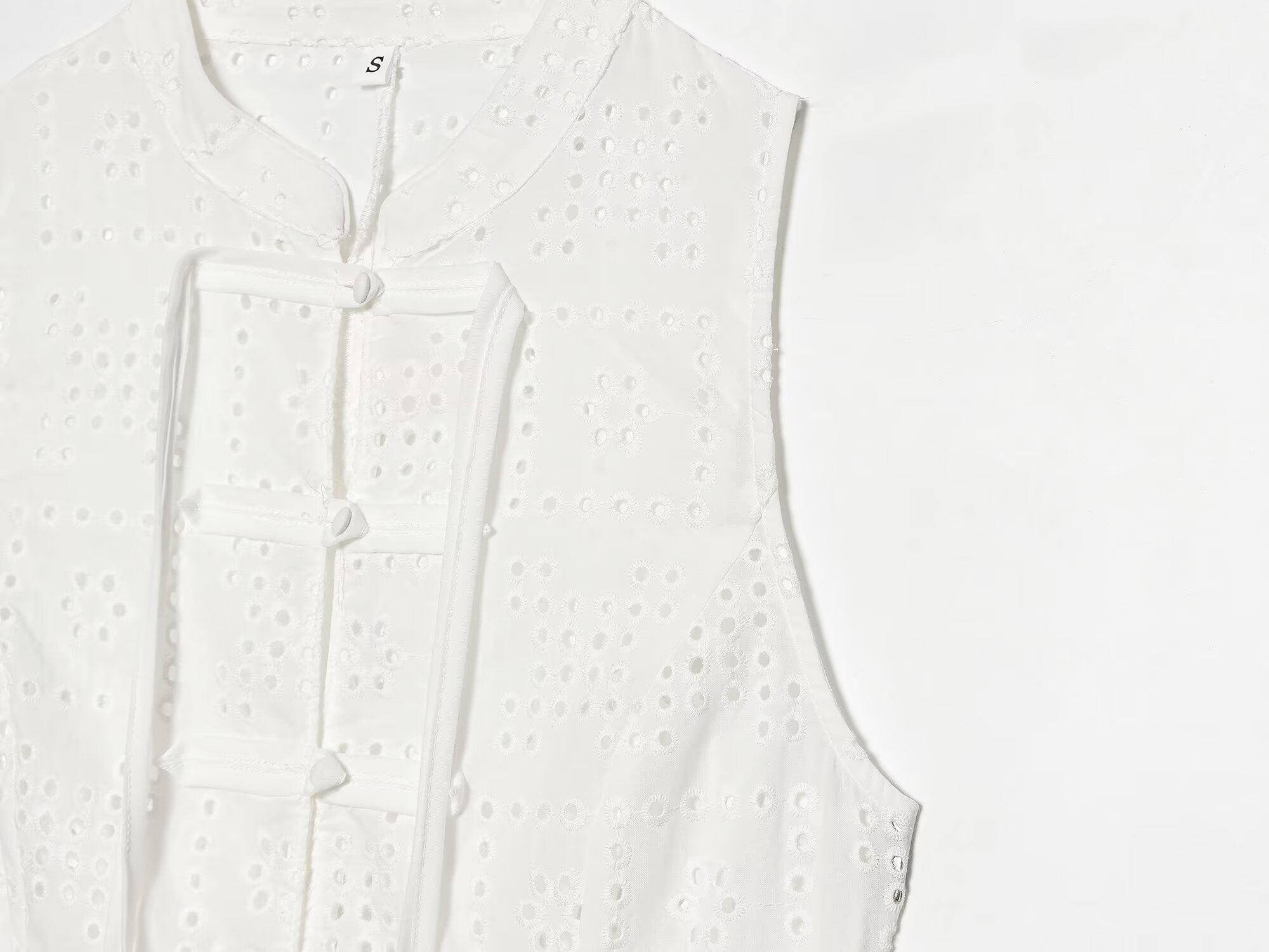Women's hollowed out embroidered top