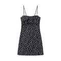 Women's sleeveless polka dot suspender dress