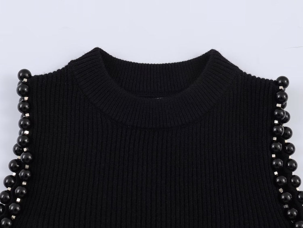 Women's hollow ball decoration O Neck knitted sweater