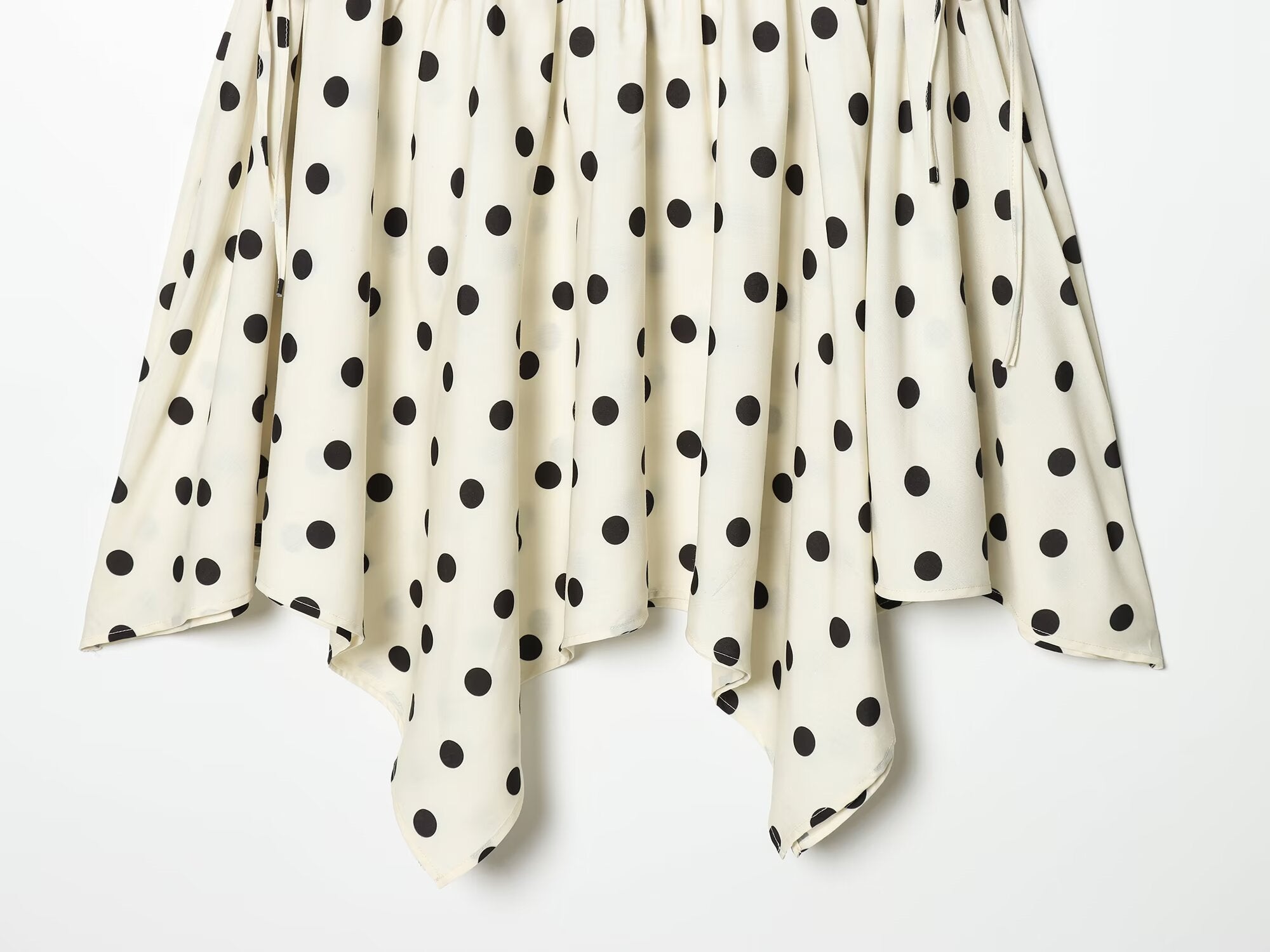 Women's asymmetrical polka dot MIDI skirt