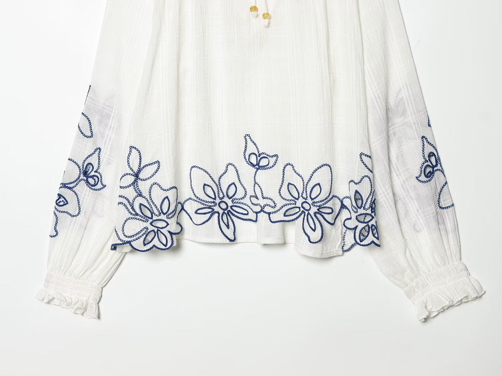 Women's floral embroidered lace up shirt