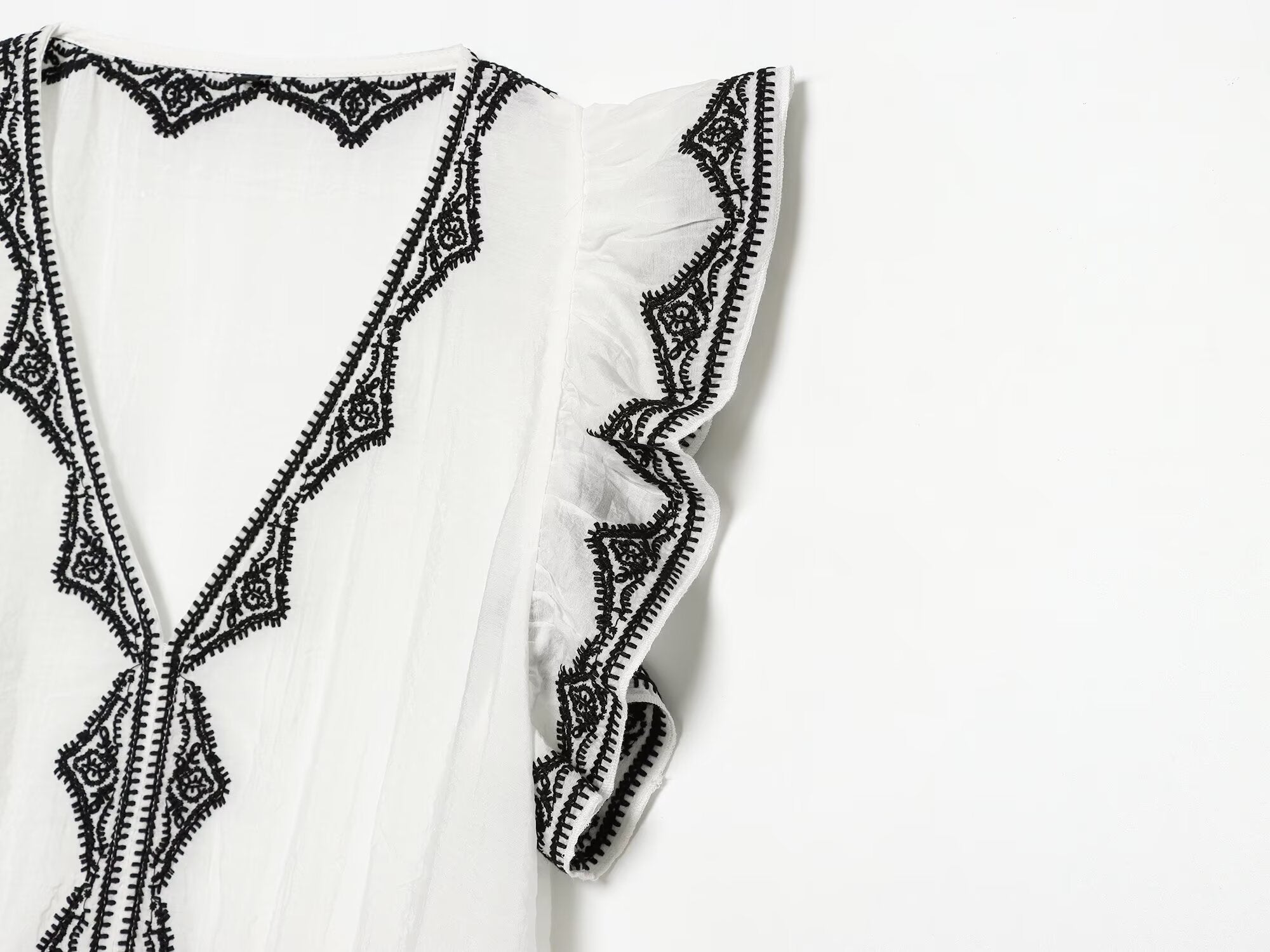 Women's contrasting embroidered top
