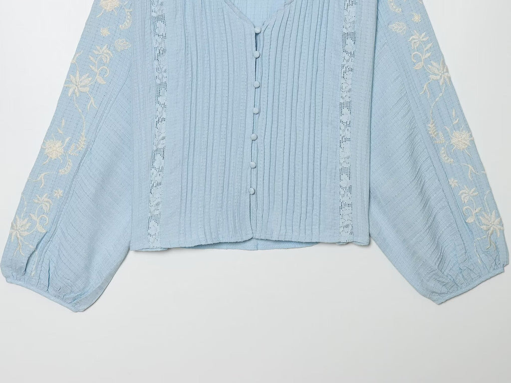 Women's contrasting embroidered V-neck shirt