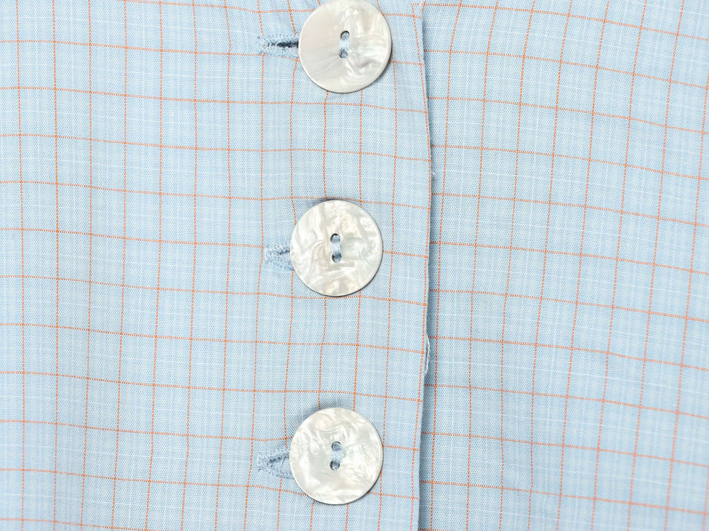 Women's short skirt style hem plaid top