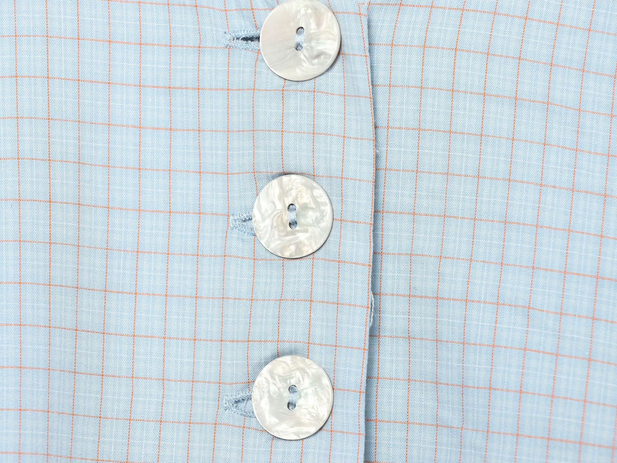 Women's short skirt style hem plaid top