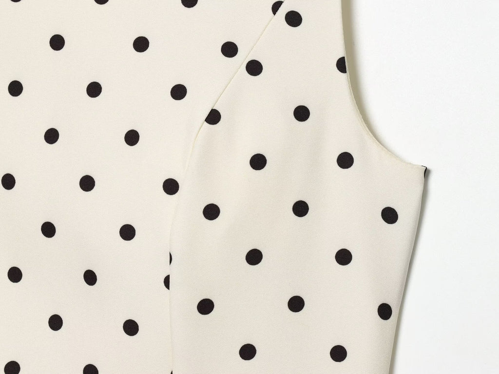 Women's ruffled hem polka dot sleeveless top