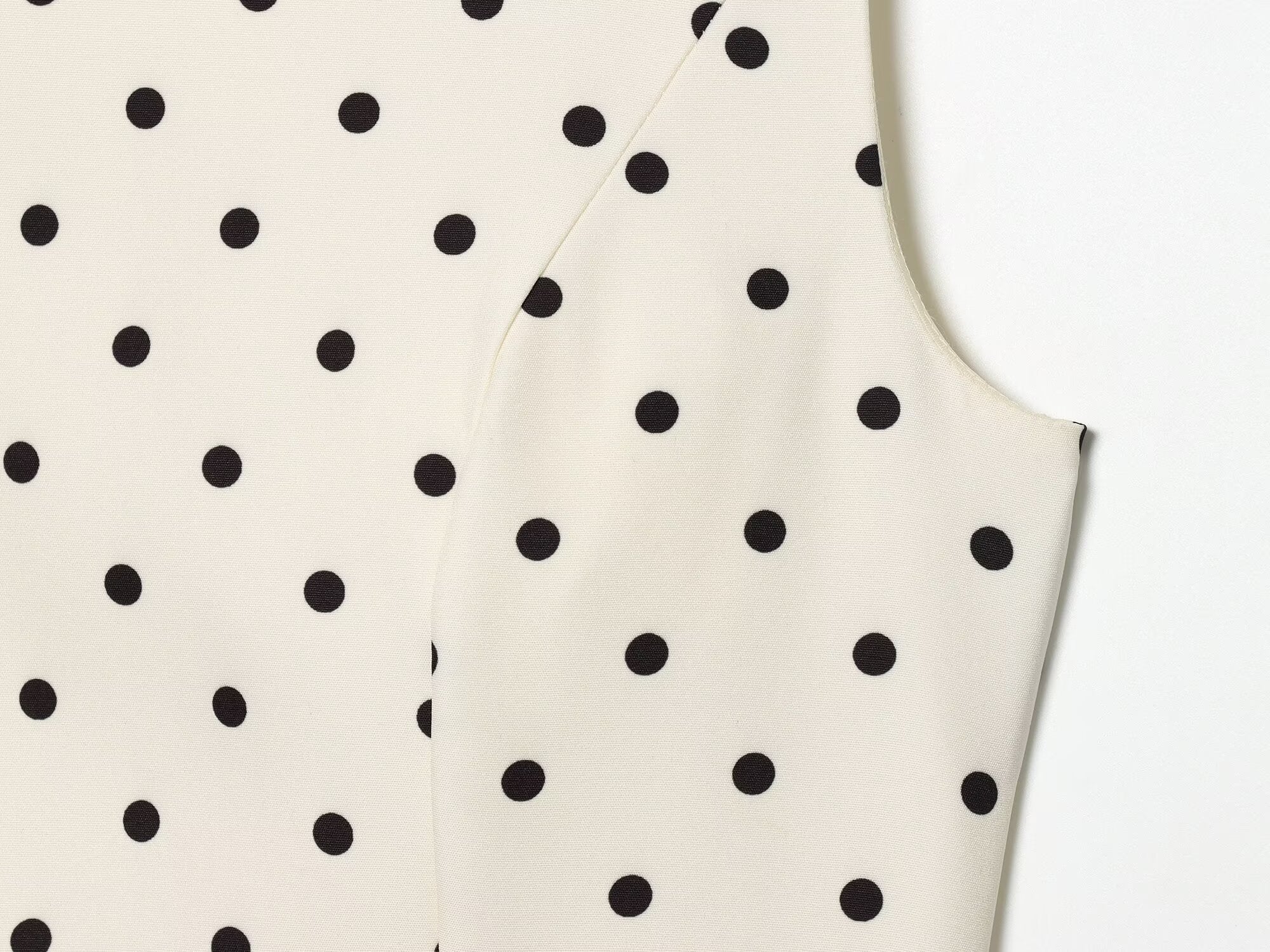 Women's ruffled hem polka dot sleeveless top