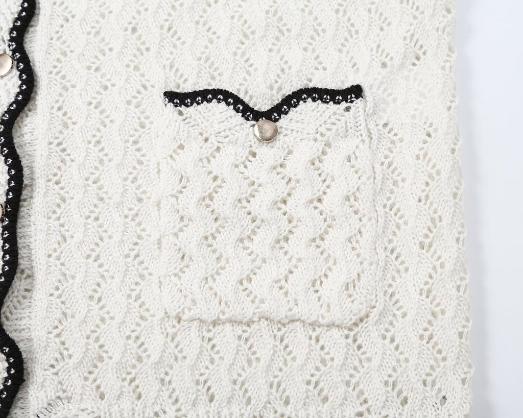 Women's hollowed out jacquard knitted cardigan